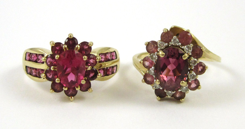 Appraisal: TWO FOURTEEN KARAT YELLOW GOLD RINGS one with round-cut pink