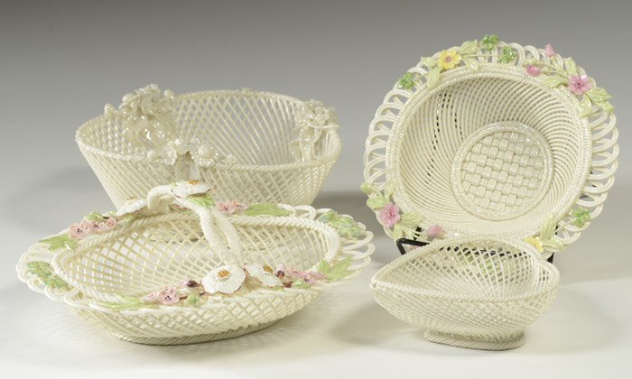 Appraisal: FOUR IRISH BELLEEK PARIAN BASKETS the small heart shaped four-strand