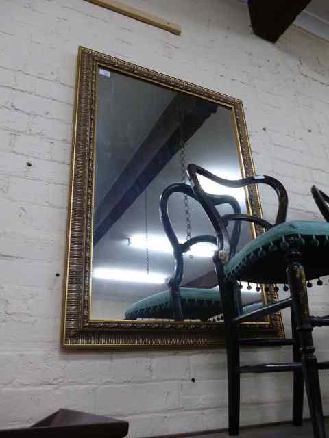 Appraisal: A GILT FRAMED RECTANGULAR WALL MIRROR x overall