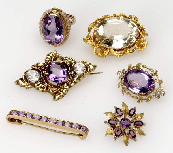 Appraisal: GOLD AND AMETHYST OR ROCK CRYSTAL JEWELRY Five brooches and