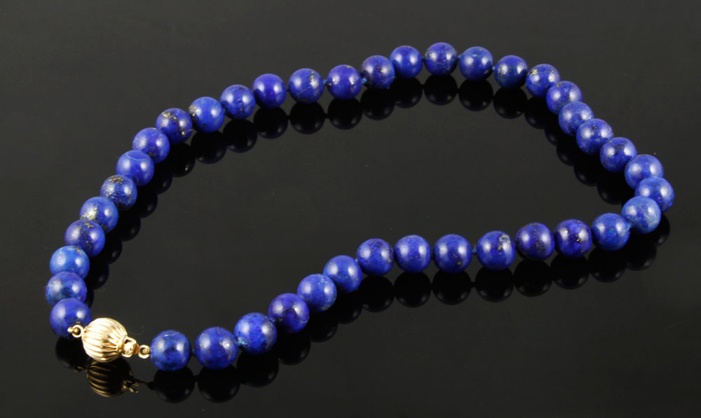 Appraisal: - Lapis Bead Necklace Lapis bead necklace with K yellow