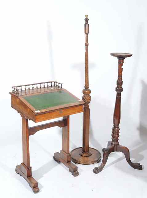 Appraisal: A VICTORIAN WALNUT WRITING DESK with galleried back and green