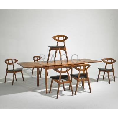 Appraisal: KURT OSTERVIG Attr Extension dining table and six dining chairs