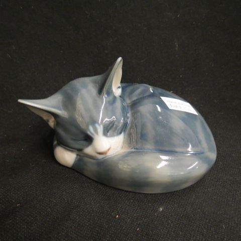 Appraisal: Royal Copenhagen Porcelain Figurine ofa Sleeping Cat diameter excellent