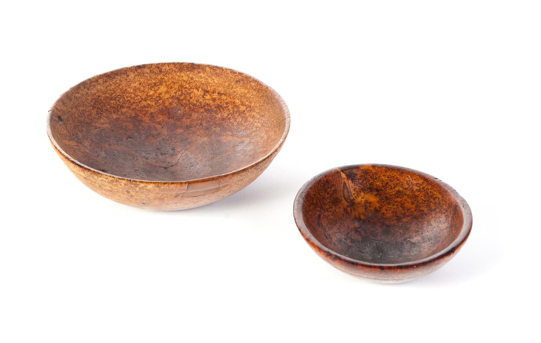 Appraisal: TWO AMERICAN BURL BOWLS Nineteenth century Turned bowls with rims