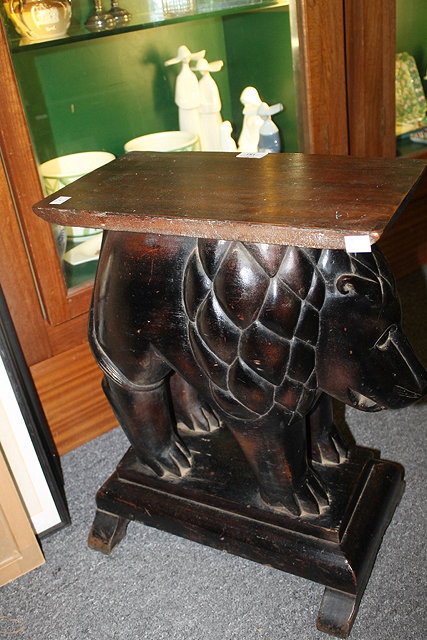 Appraisal: AN EASTERN HARDWOOD CARVED OCCASIONAL TABLE in the form of