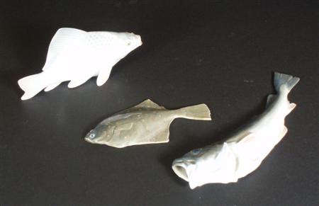 Appraisal: Three Royal Copenhagen porcelain figures of fish each painted naturalistically