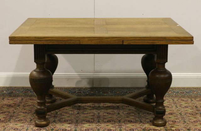 Appraisal: A late th century oak extension dining table in the