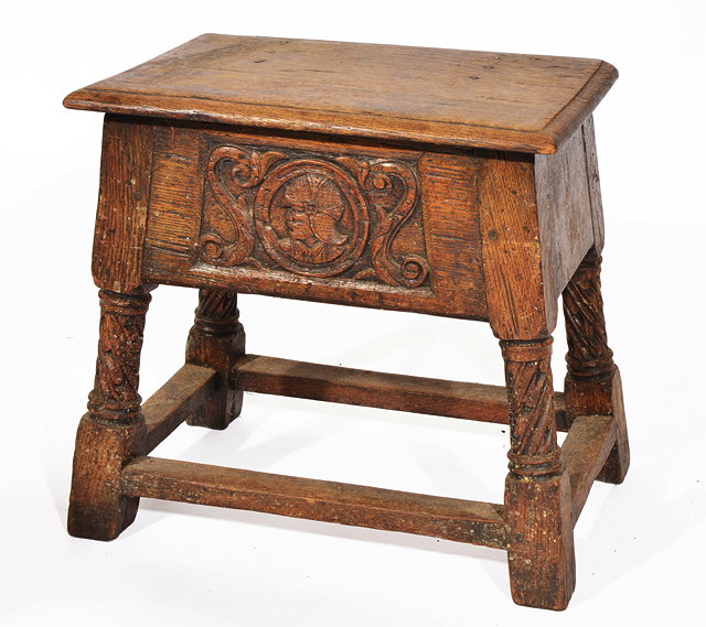 Appraisal: AN ANTIQUE OAK JOINT STOOL having a lifting hinged lid