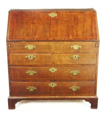 Appraisal: A George I walnut bureau feather and cross banded the