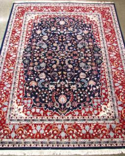 Appraisal: Description Handmade Oriental Room Size Rug Kashan design blue field