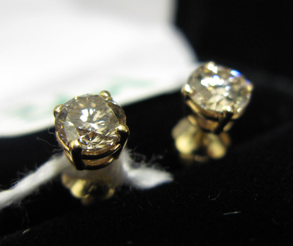 Appraisal: PAIR OF DIAMOND AND FOURTEEN KARAT GOLD EAR STUDS each