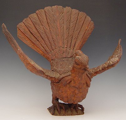 Appraisal: th C AMERICAN FOLK ART CARVED GROUSE Intricately carved wood