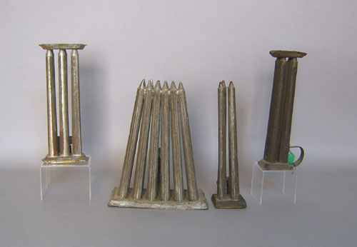 Appraisal: Four tin candlemolds together with a candlebox