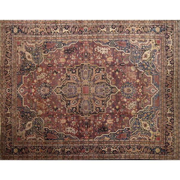 Appraisal: PERSIAN Oriental carpet with large central medallion on raspberry ground