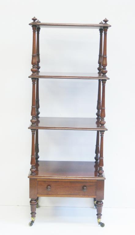 Appraisal: A th Century mahogany three tier Whatnot fitted drawer on