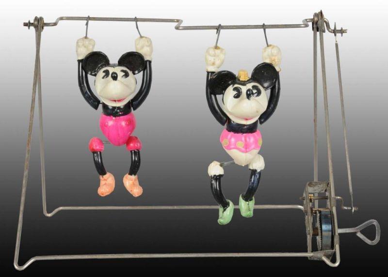 Appraisal: Walt Disney Celluloid Mickey Minnie Acrobat Toy Description Includes rare