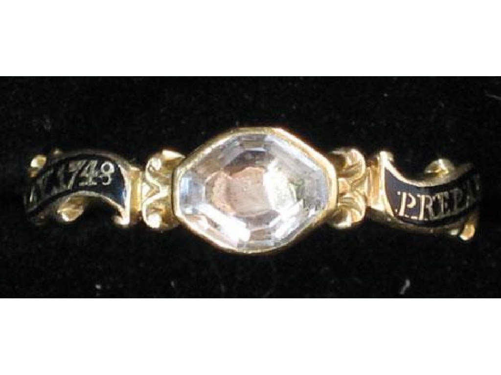 Appraisal: A GEORGE II MEMORIAL RING with a lozenge shaped crystal