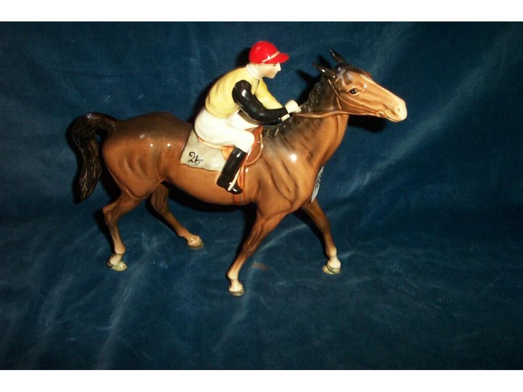 Appraisal: A Beswick model of a brown racehorse with number painted