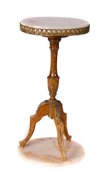 Appraisal: A gilt metal hardwood and onyx occasional table height in