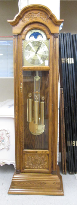 Appraisal: AN OAK TALL CASE FLOOR CLOCK Seth Thomas Clock Co