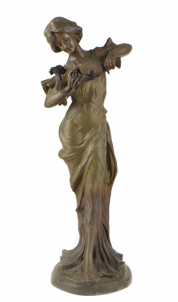 Appraisal: A patinated metal figure of a maiden Titled PARFUM Par