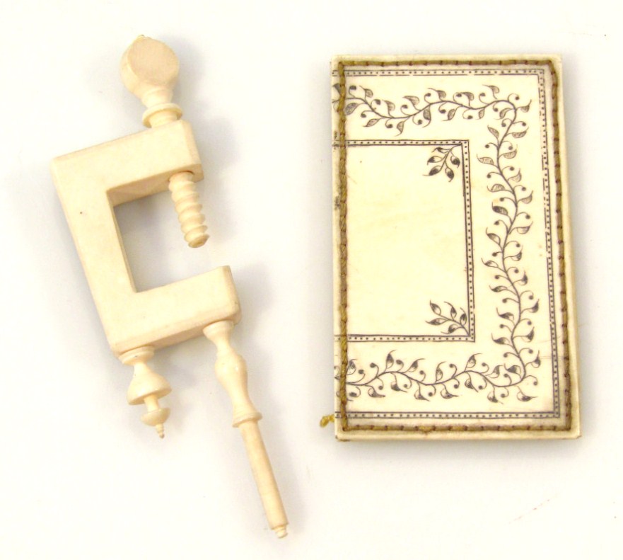 Appraisal: A late thC ivory sewing clamp of G shaped articulated