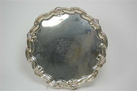 Appraisal: A shaped circular salver by Walker Hall Sheffield of shaped