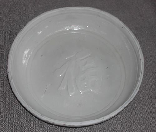 Appraisal: Chinese Provincial Ivory and Black Oil-Glazed Stoneware Circular Dish first