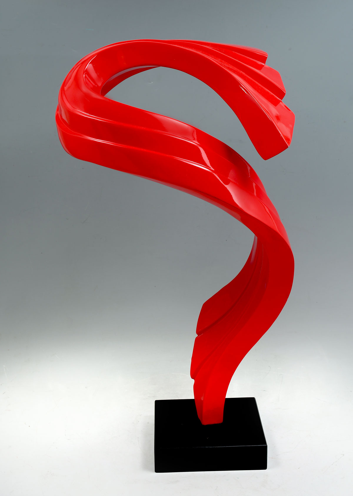 Appraisal: LIPSTICK RED STYLIZED MODERN RIBBON SCULPTURE Approx '' in height