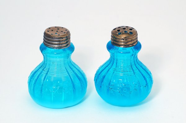 Appraisal: Victorian blue opalescent salt and pepper shakers mold blown ribbed