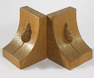 Appraisal: A pair of Robert Mouseman Thompson oak book ends adzed