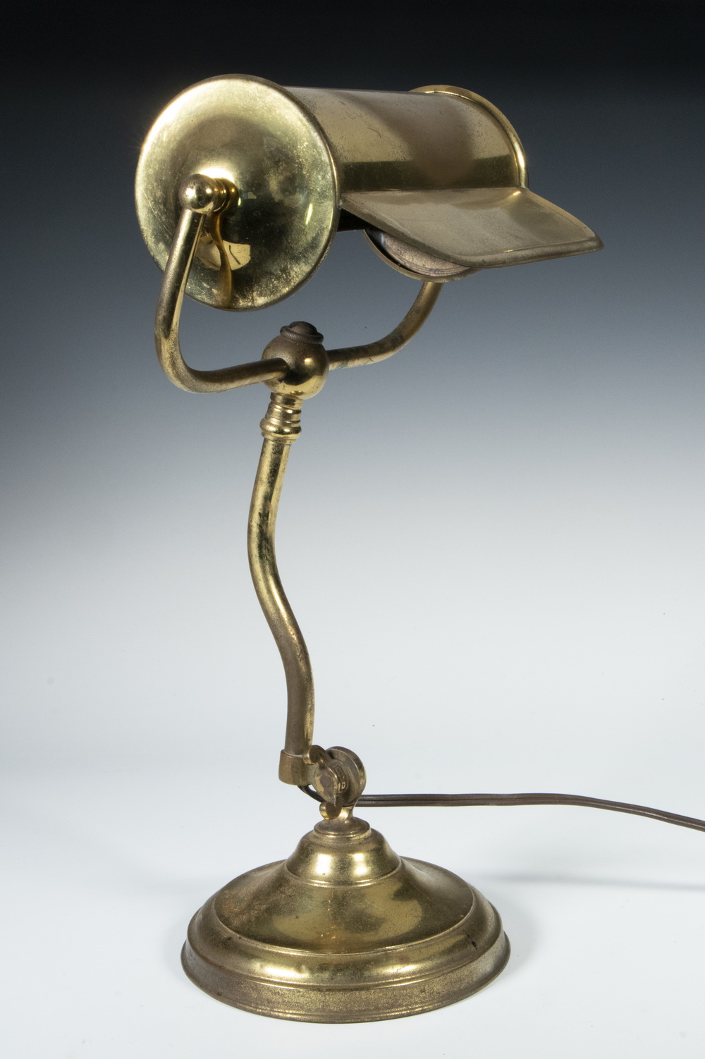 Appraisal: BRASS DESK LAMP Vintage Lamp with adjustable shade round brass