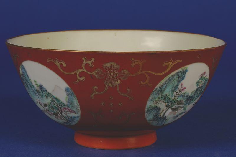 Appraisal: A CHINESE BOWL enamelled in polychrome with four circular landscape