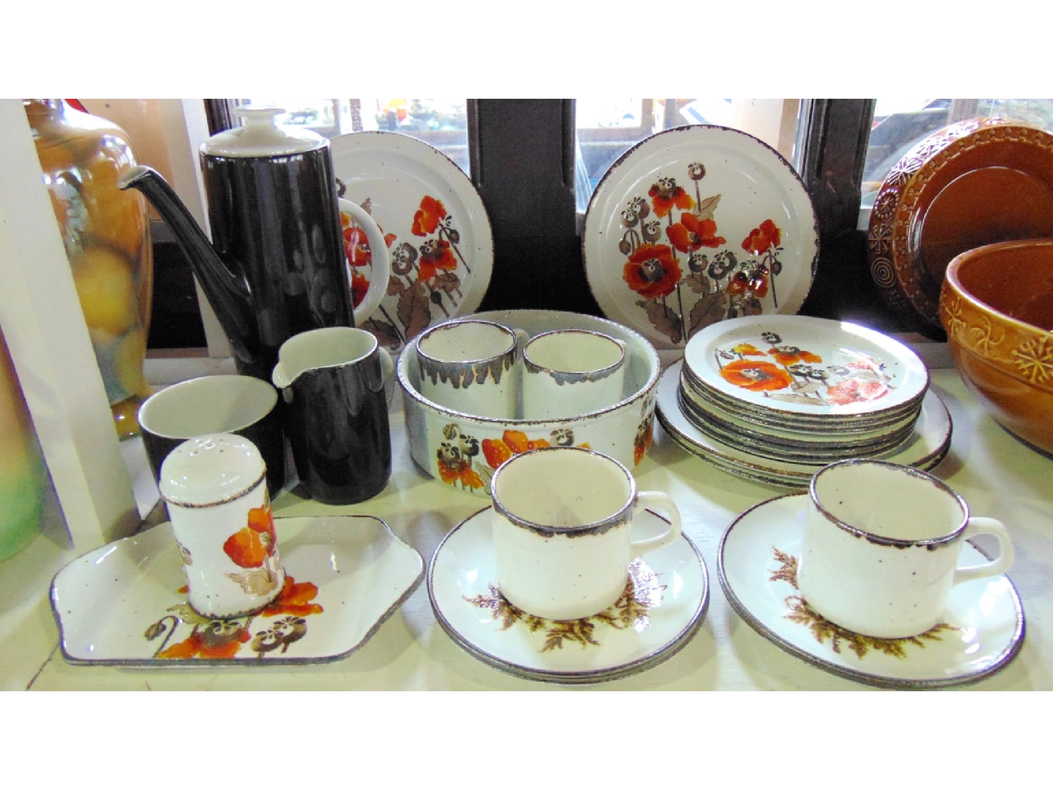 Appraisal: A collection of Midwinter Stonehenge Autumn pattern dinner and tea