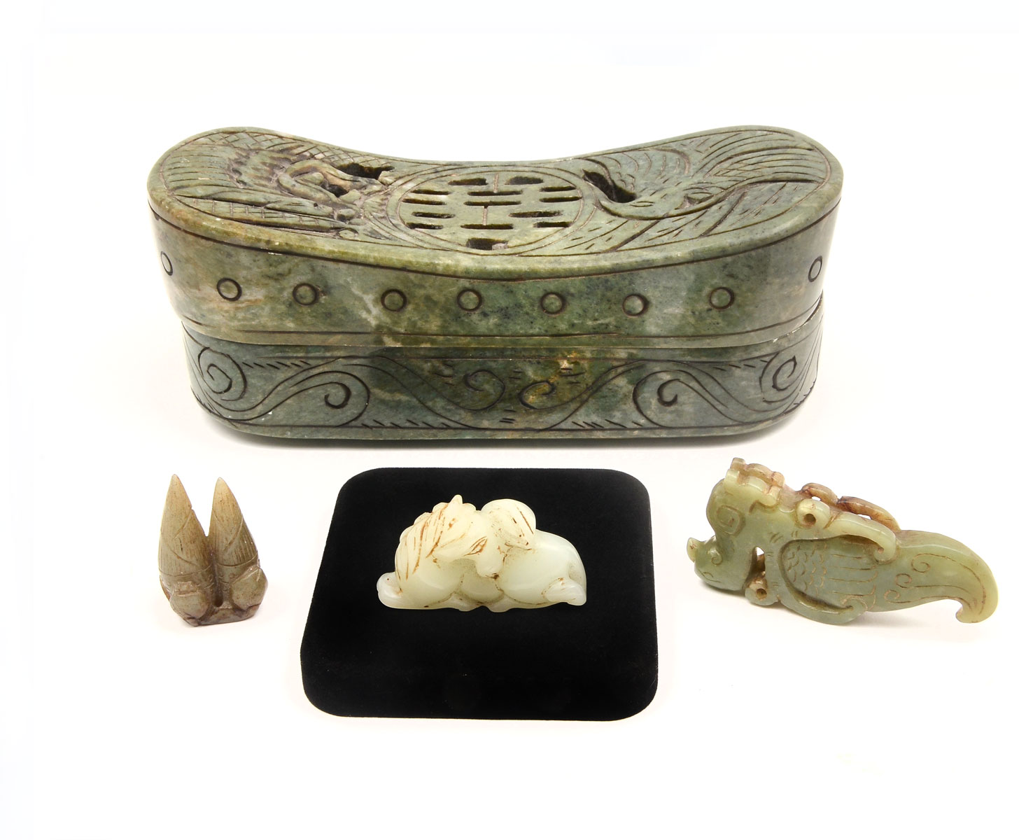 Appraisal: PC CHINESE JADE COLLECTION Comprising - recumbent white celadon jade