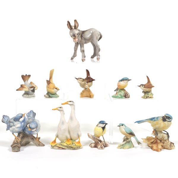 Appraisal: ELEVEN GIUSEPPI TAGLIARIOL PORCELAIN BIRDS AND DONKEY FIGURINES TAY COLLECTION