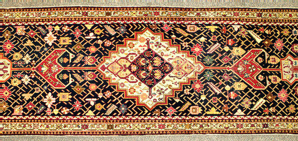 Appraisal: x Caucasian rug one end approximately short other end approximately