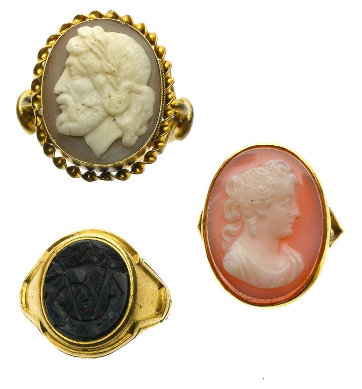 Appraisal: TWO ANTIQUE HARDSTONE CAMEO RINGS one mounted in gold the