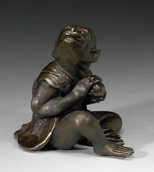 Appraisal: A patinated bronze okimono of a monkey Meiji Period Well