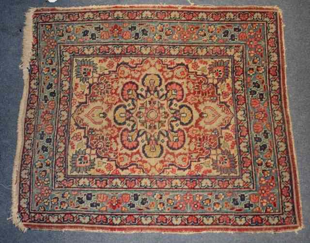 Appraisal: A TURKOMAN SMALL MAT woven with three vertical rows of