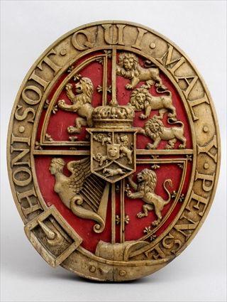 Appraisal: ENGLISH CARVED AND PAINTED PINE OVAL ORDER OF THE GARTER