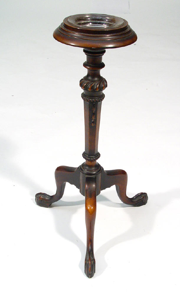 Appraisal: Victorian mahogany candle stand with a circular dished top supported