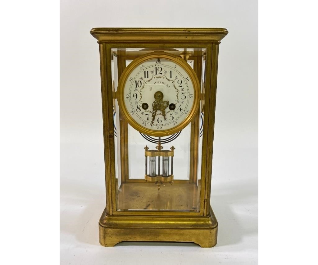 Appraisal: French brass and beveled glass clock with porcelain dial h