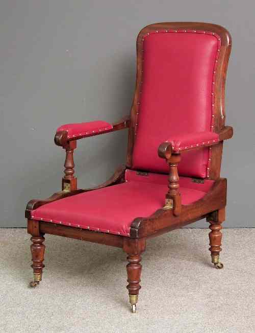 Appraisal: An early Victorian mahogany framed ''Campaign'' armchair by Ross Co