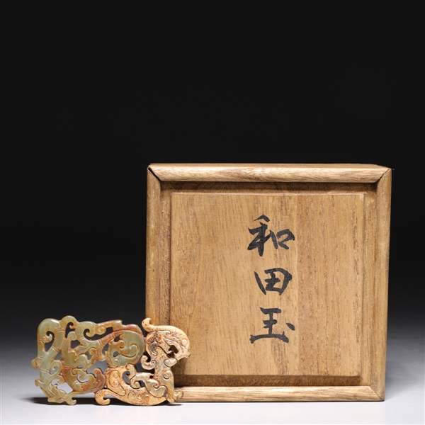 Appraisal: Elaborately carved openwork jade toggle with some gilt Japanese box