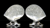 Appraisal: Pair of Carved Mother of Pearl Shell Plaques Intricately carved