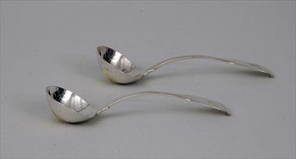 Appraisal: Pair of George III Silver Monogrammed Sauce Ladles in the