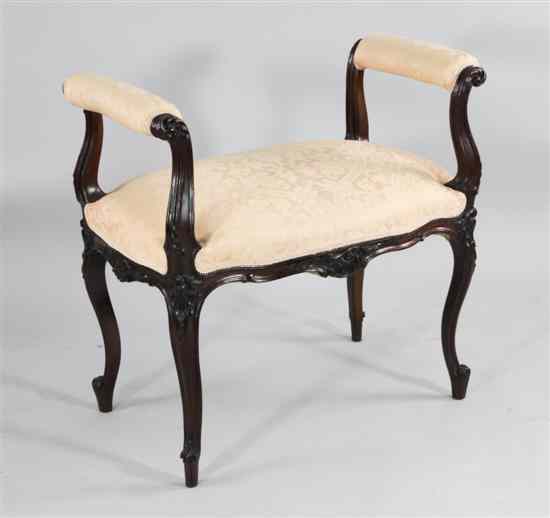 Appraisal: A Victorian carved mahogany stool decorated with shells on cabriole