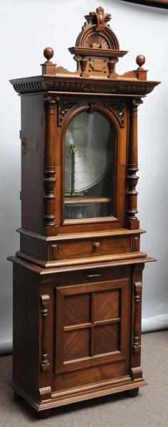 Appraisal: Polyphon Disc Upright On walnut reproduction disc storage base Double